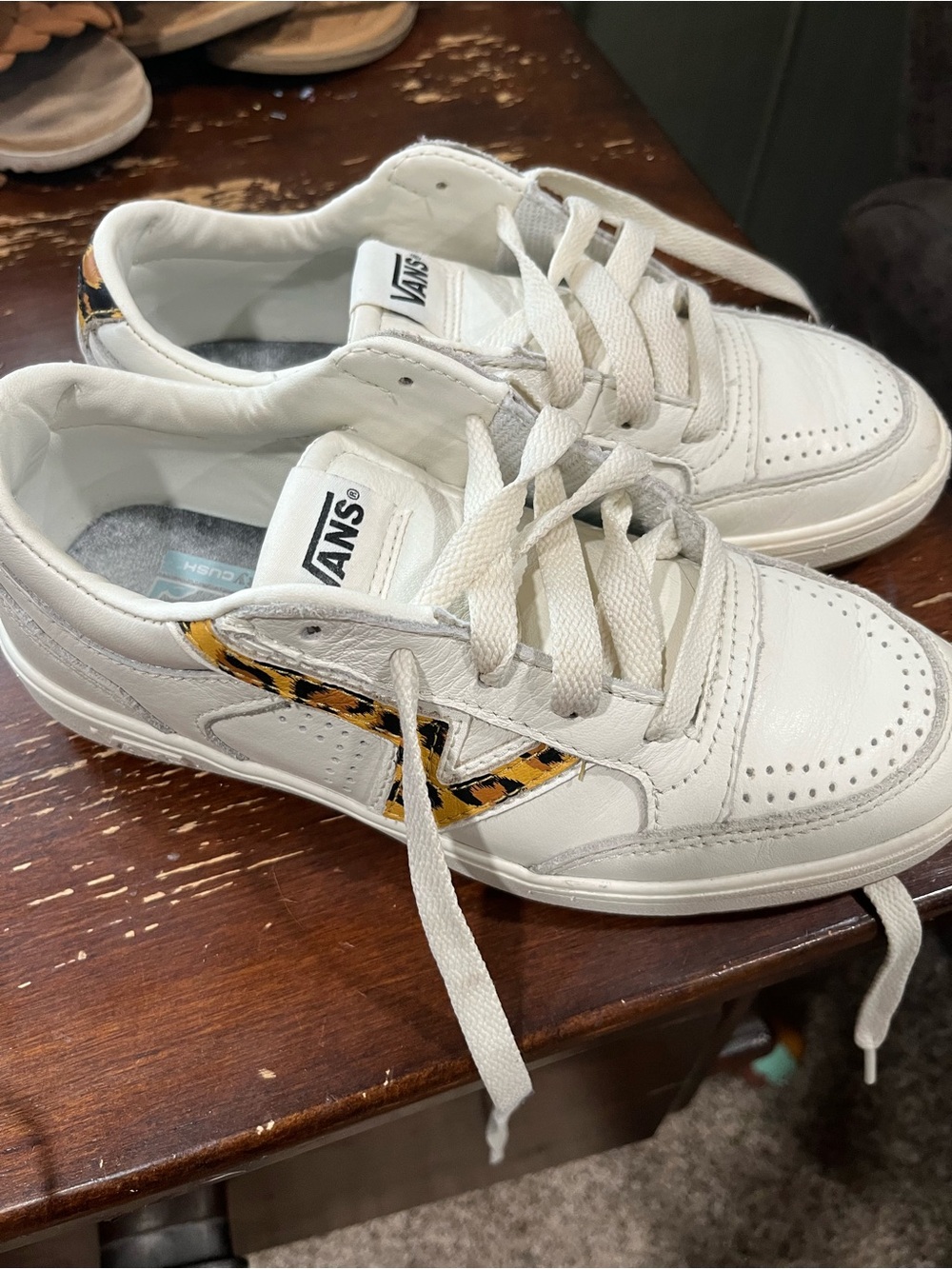 Vans Women’s White Leather Sneakers with Yellow Leopard Accent